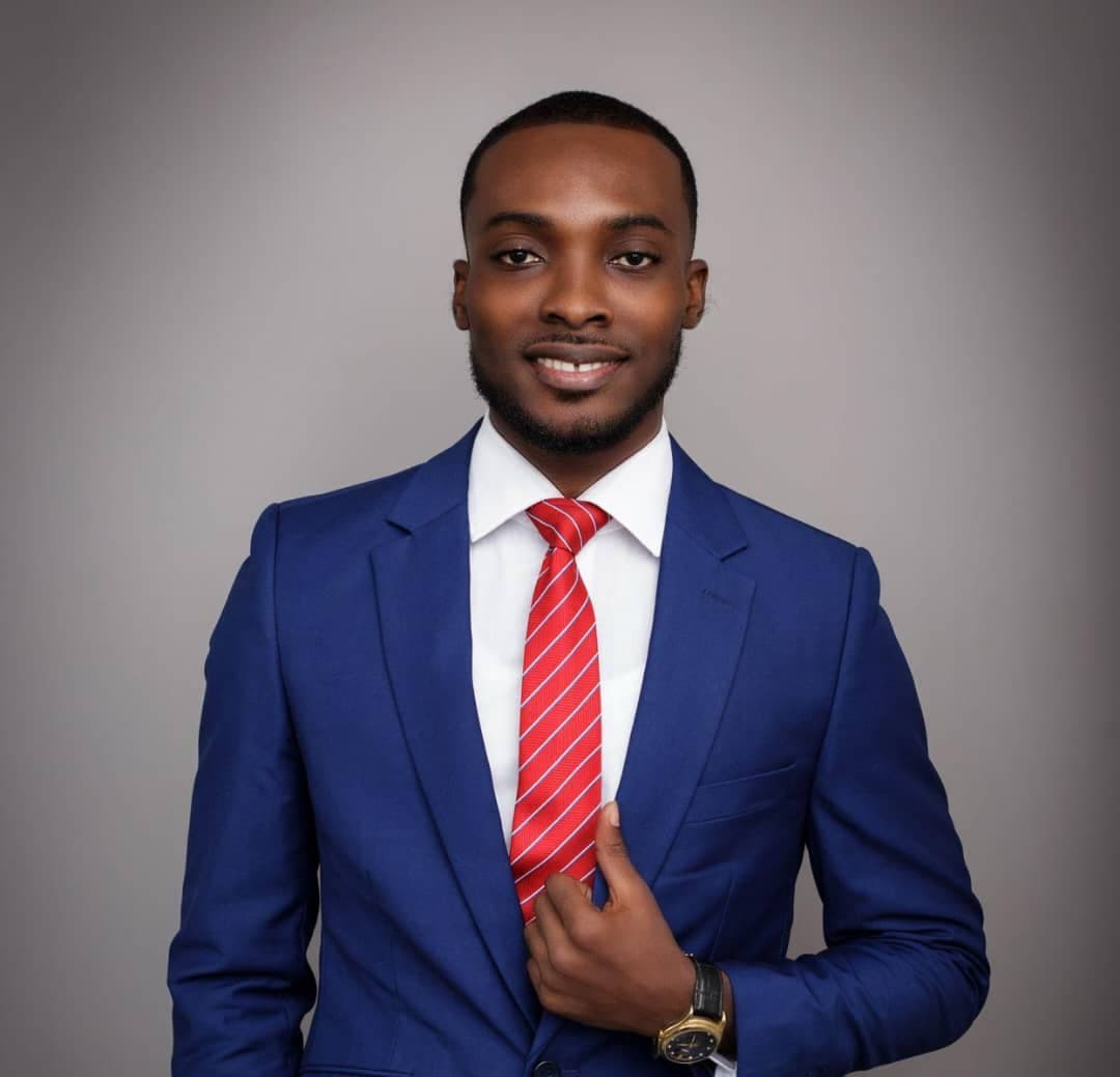 Coders Clutch team member in a blue suit