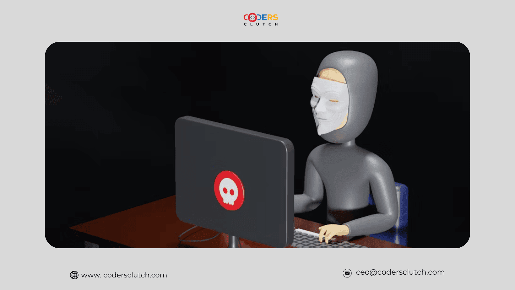 A masked, hooded hacker working at a computer with a red skull icon on the back of the screen.