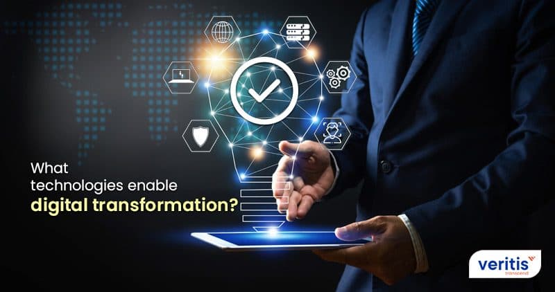 Businessman holding a tablet with glowing automation icons above it